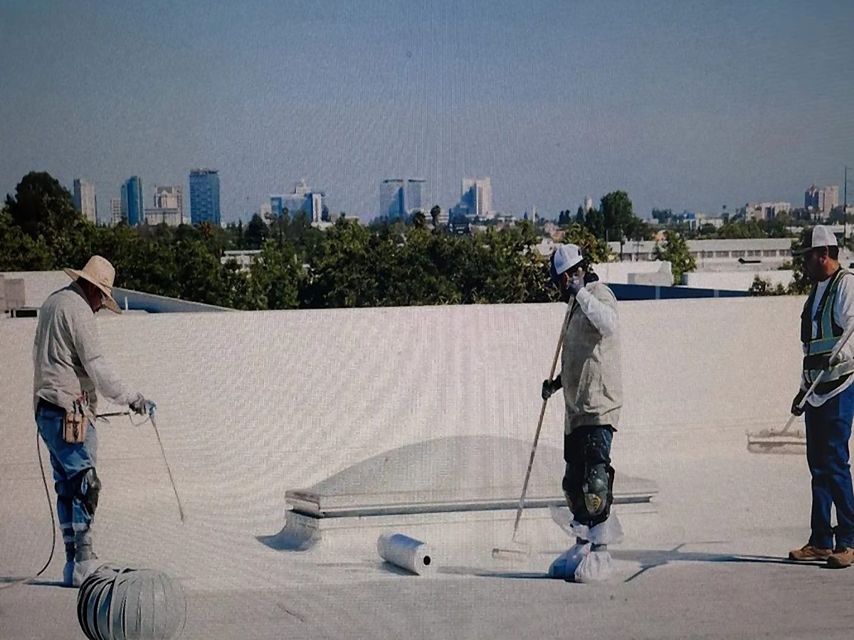 Just Leaks crew performing commercial roof preventative maintenance in the Bay Area