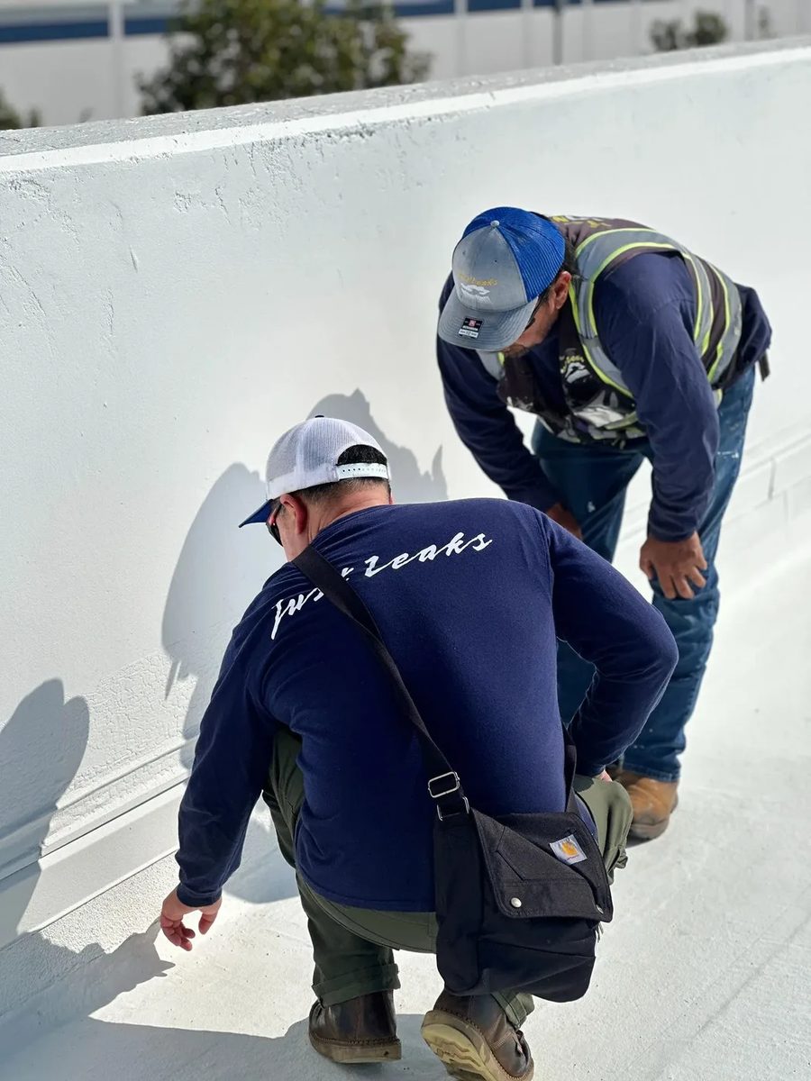Commercial roof assessment and inspection by Just Leaks technicians